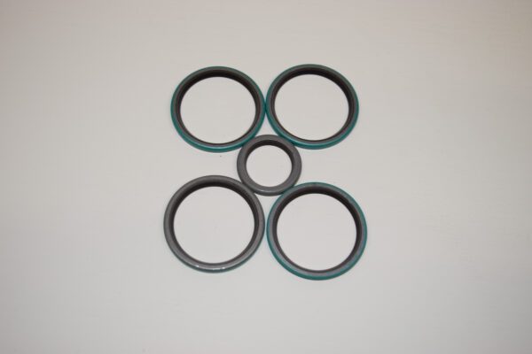 A group of five rings sitting on top of a table.
