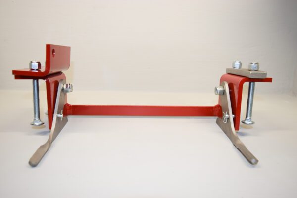 A pair of Bracket / Hitch with Spring Assist Bracket Toro Wheel Horse clamps on a white background.