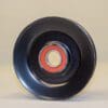 A black and red object is sitting on the floor