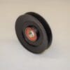 A Pulley for Wheel Horse on a white surface.