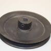 A black plastic disc with a hole in the middle.