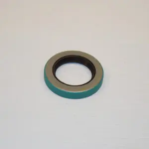 A close up of a seal ring on a white surface
