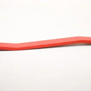A red stick is bent to the side