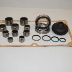 A set of bearings and seals are laid out on the table.
