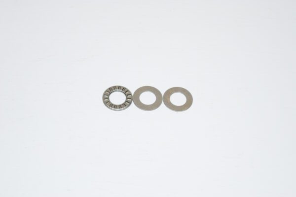 A set of three thrust washers for the front wheel.
