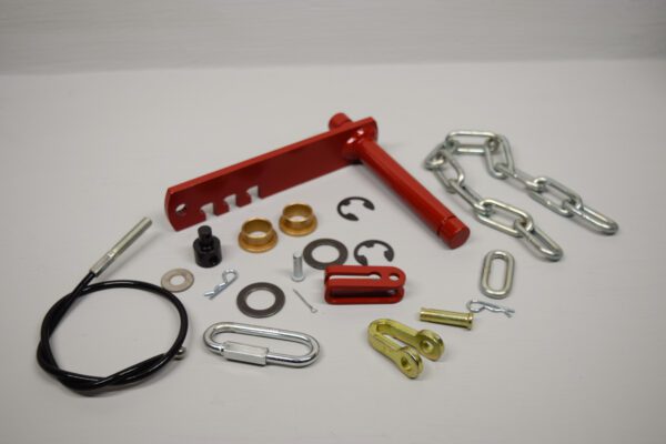 A Toro Wheel Horse Rock Shaft Kit for Manual Transmission - Short Clevis - Read Description with a chain and a chain.