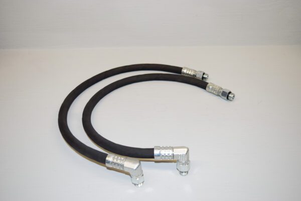 A pair of # 106651 2 Pump Replacement Hydraulic Hoses for Wheel Horse on a white surface.
