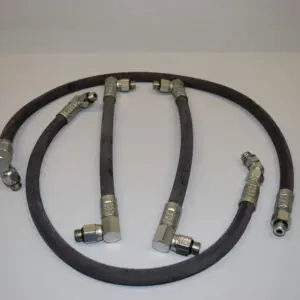 A set of four hoses with different connections.