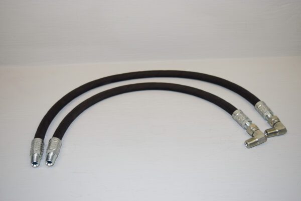A pair of black rubber hoses with an end on each side.