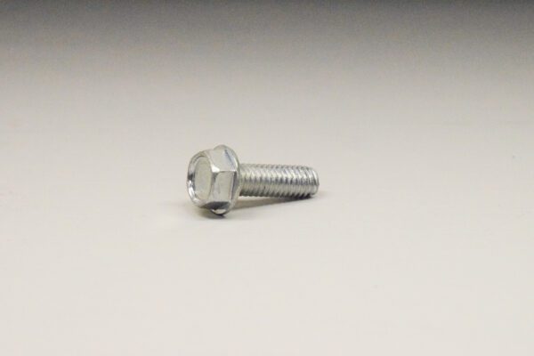 A close up of a screw on a table