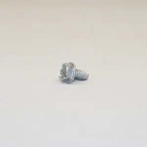 A close up of a screw on top of a table