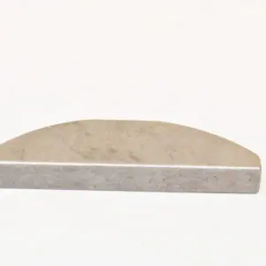 A white marble surface with a curved edge.