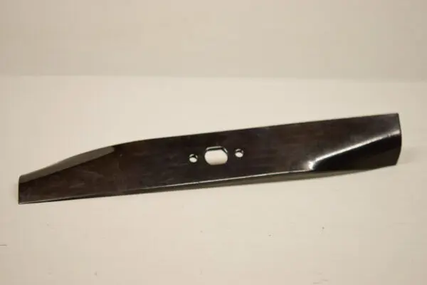 A close up of the blade on a white surface