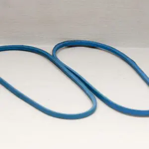 A pair of blue belts sitting on top of a table.