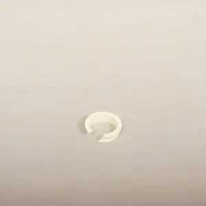 A white ring is sitting on the ceiling.
