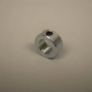 A metal object with one hole in it.
