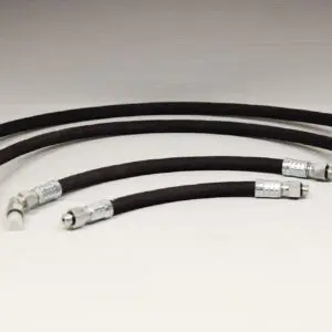 A pair of black hoses with an end on each side.