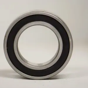 A close up of a ball bearing on a white surface